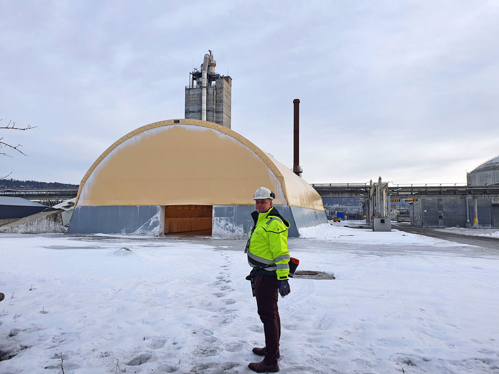 man standing in snow, rubber hall