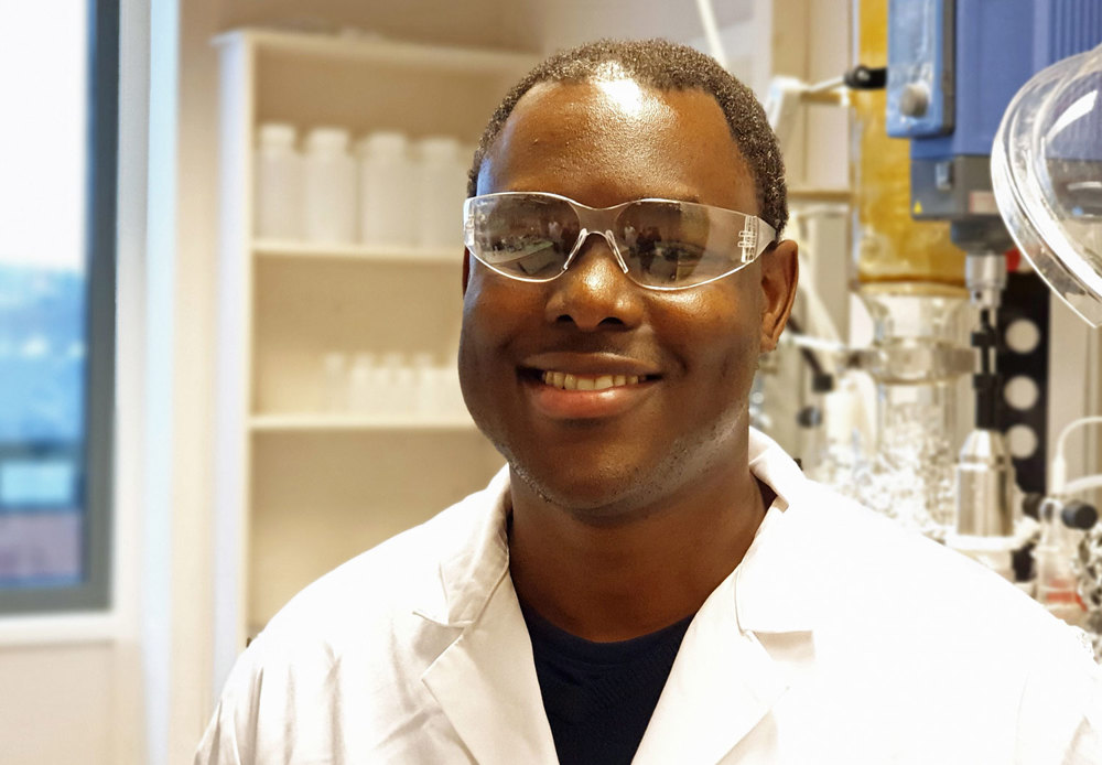 portrait of young man, white lab coat