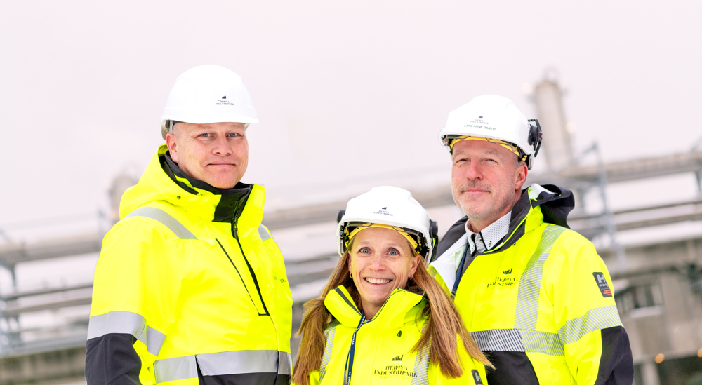 portrait, posing, three people, white helmets, yellow jackets, outdoors,